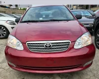 Clean wine Toyota Corolla 